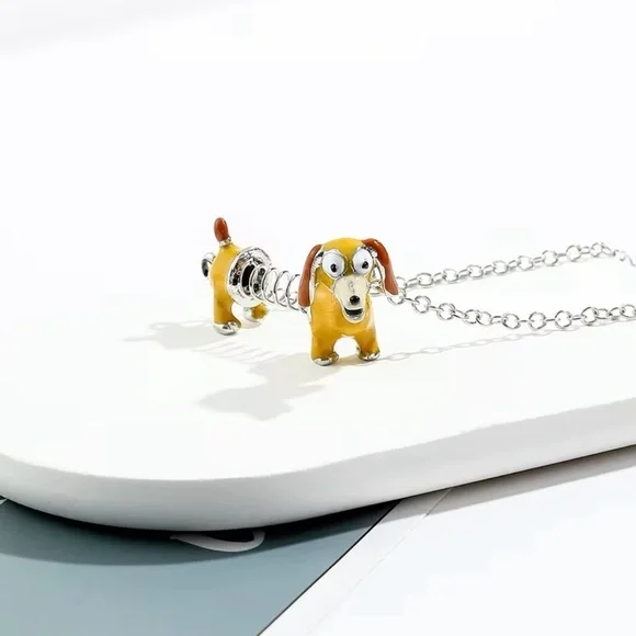 ⭐️NEW⭐️ Toy Story Slinky Dachshund Dog Pendant Necklace - Picture 5 of 8